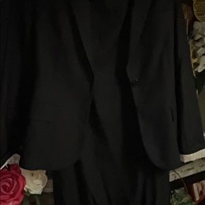 This is a black dress with blazer size 6